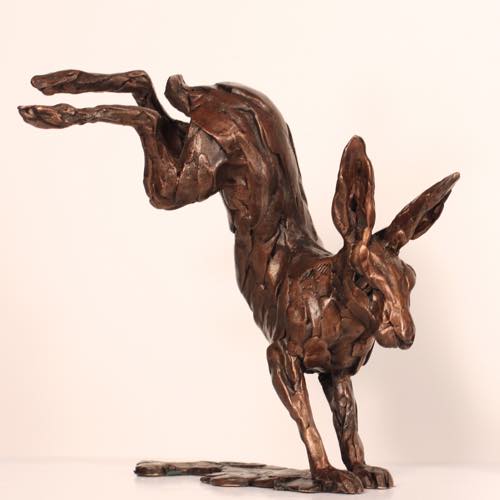 Kicking Hare a bronze sculpture by Kate Denton